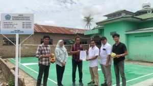 Tim PKM Polmed Bangunan Lapangan Sepak Takraw